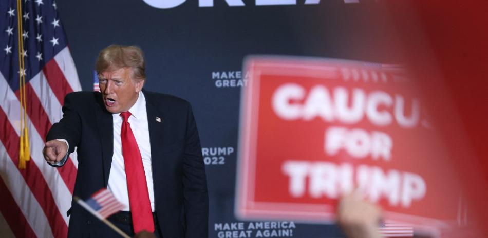 El candidato presidencial republicano, Donald Trump, celebra un acto de campaña en Coralville, Iowa / SCOTT OLSON/AFP